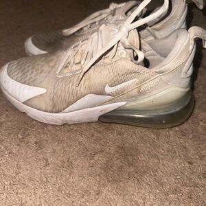 Nike air tennis shoes size 8/12, need to be cleaned.